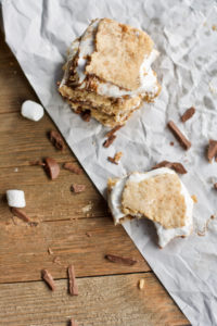 Chocolate Peanut Butter S'mores Bars are so gooey, chocolatey and delicious. Easy recipe for camping, summer and snacks.